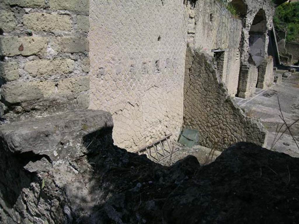 Ins Or II, 16, Herculaneum. May 2004. Rear room, upper east wall with remains of doorway looking towards the upper loggia/terrace of Ins.Or.II, 4/19.
Photo courtesy of Nicolas Monteix.